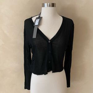 Black sheer high low button top